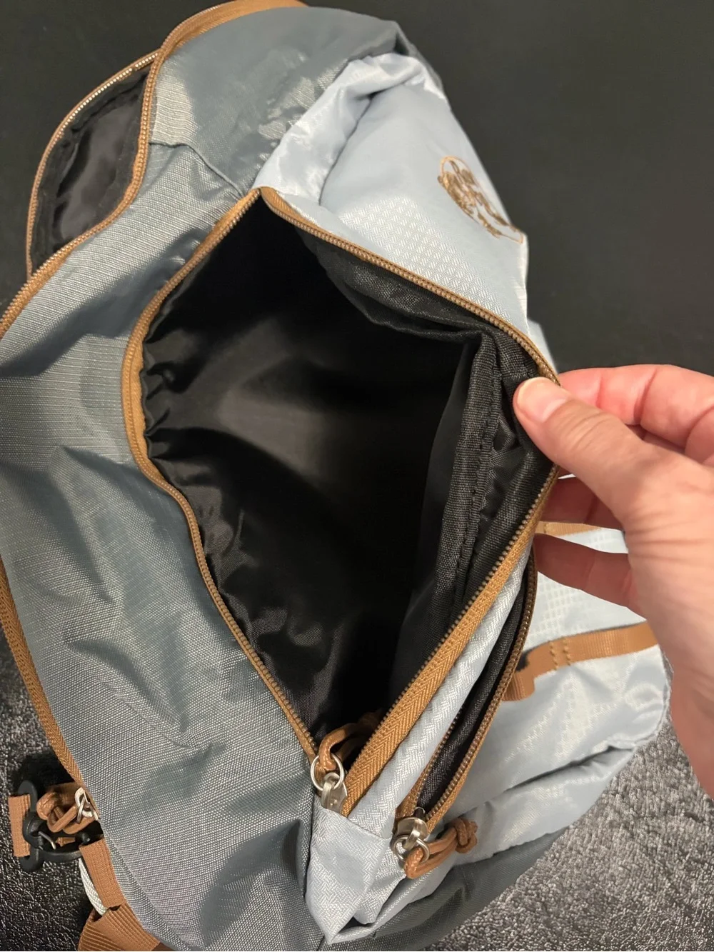 Bass Pro Shops Gray Sling Backpack with Tan Accents